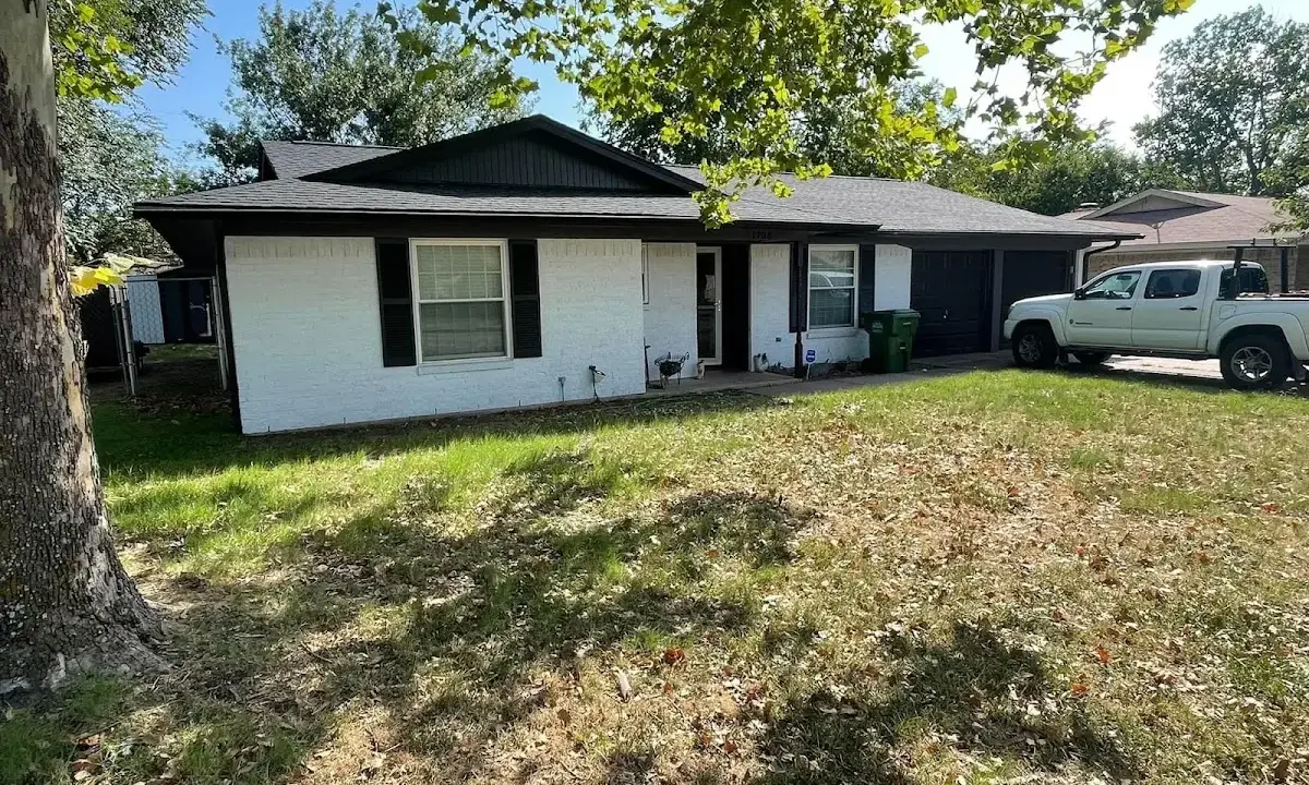 Professional roofing crew working on a residential roof in New Cumberland